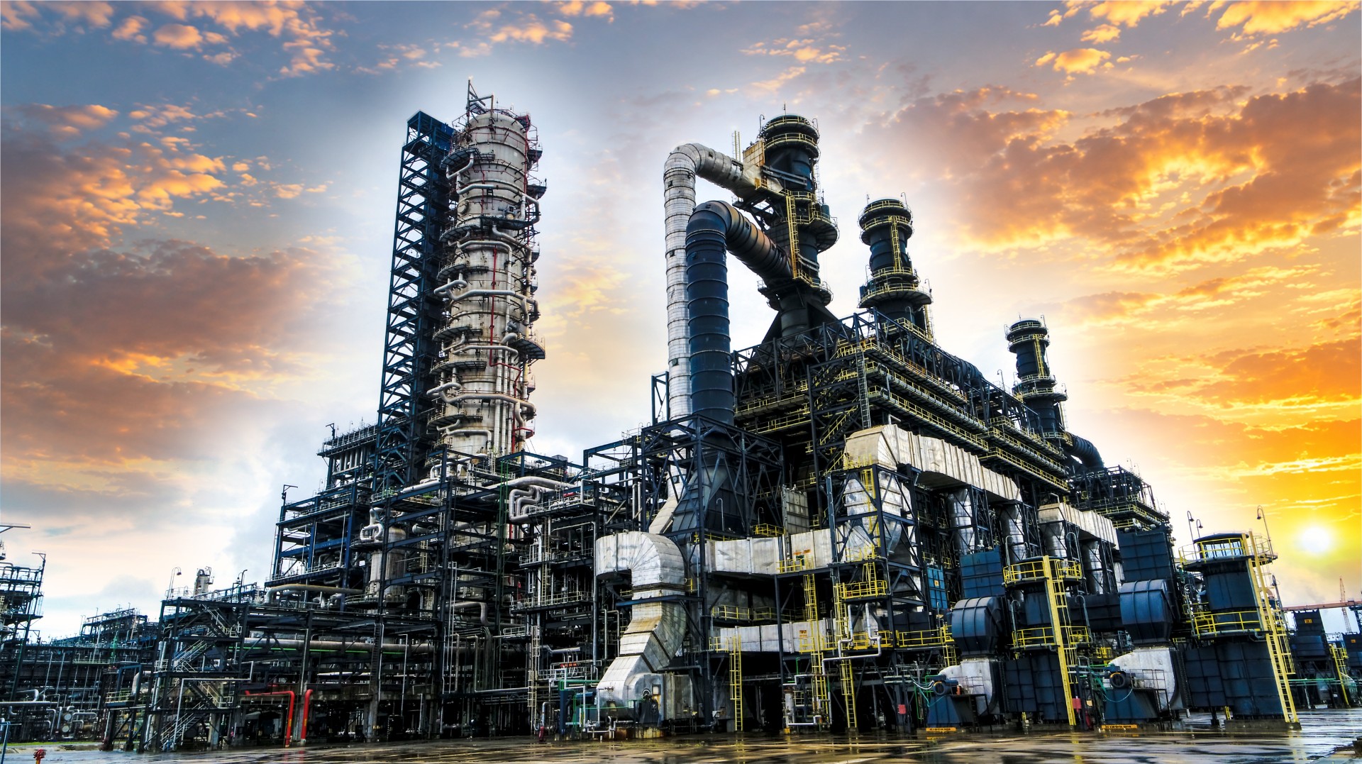 Processing towers at Dangote Petroleum Refinery at sunset