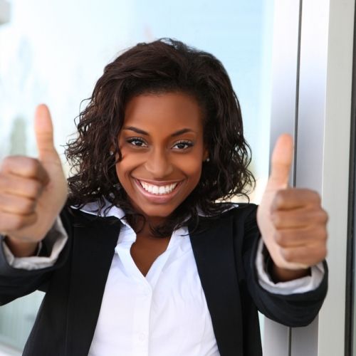 black woman giving two thumbs up