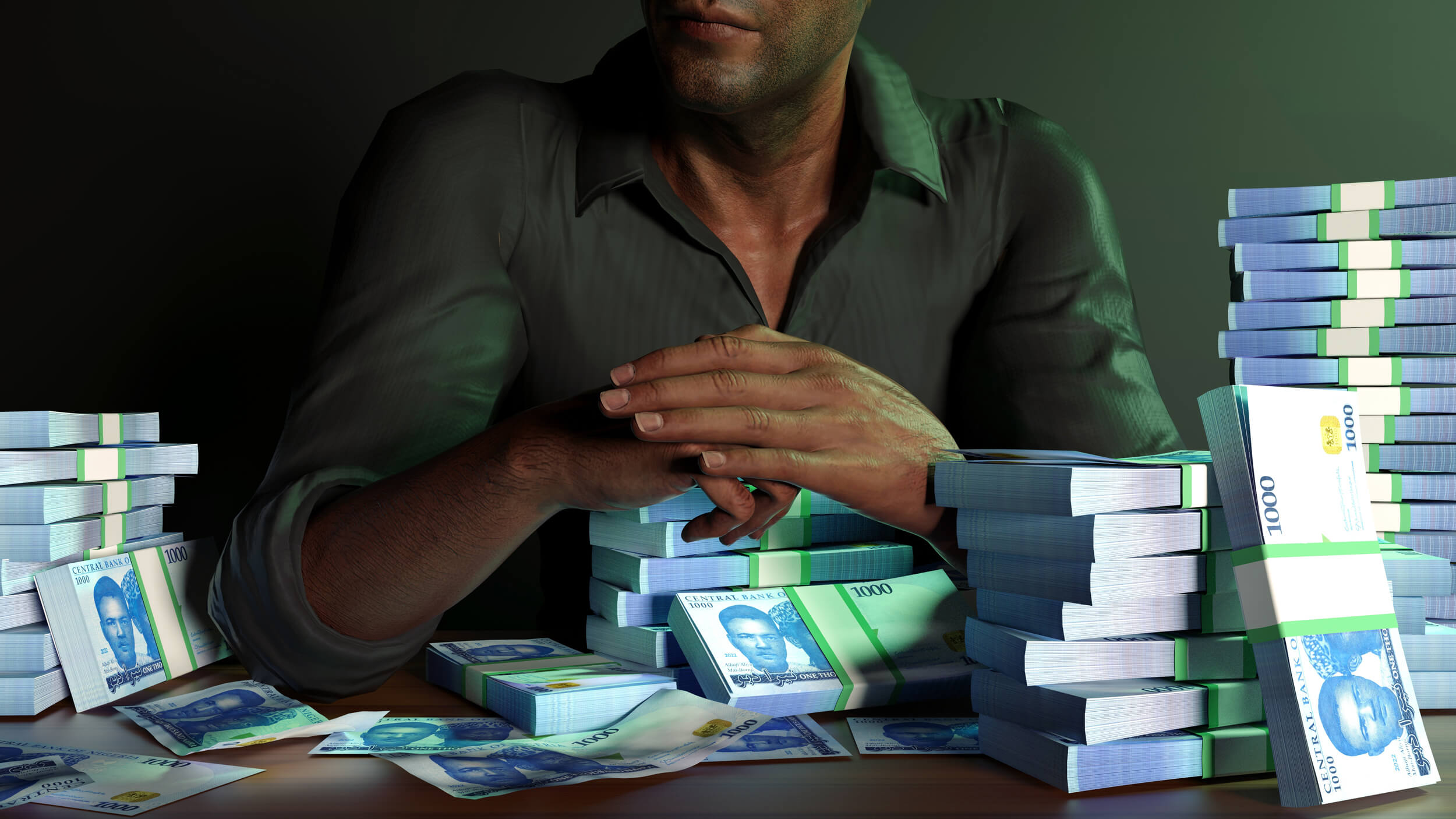 Close-up of a man in a dark shirt sitting at a table with large stacks of Nigerian 1000 naira banknotes, hands clasped together under dim lighting.